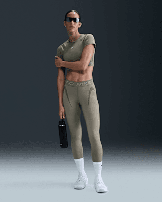 Nike Pro7/8-Tights mit mittelhohem Bund und Grafik für Damen